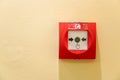 Push button switch fire alarm box on wall for warning and security system Royalty Free Stock Photo