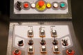 Push buttons and switches on a control panel