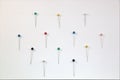 Push pins on various colors Royalty Free Stock Photo