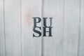 `Push` sign on wooden at entrance door handle restaurant Royalty Free Stock Photo