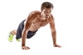 Push up fitness man doing push-up bodyweight exercise on gym floor. Athlete working out chest muscles strength training