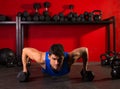 Push-up strength man hex dumbbells workout at gym