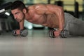 Push Ups With Dumbbels Royalty Free Stock Photo