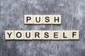 Push yourself motivation formed with plastic tiles