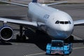 Delta Plane on pushback at the airport