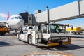 Pushing the airplane back the cart tow tracktor on the front lan Royalty Free Stock Photo