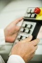 Pushing the button on the control panel Royalty Free Stock Photo