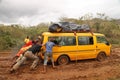 Pushing the car out of mud Royalty Free Stock Photo