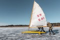 Pushing an ice-yacht to get full speed