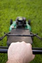 Pushing the Lawn Mower Royalty Free Stock Photo
