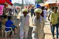 Pushkar, India: Couple of local rajasthani old men walking in ethnic wear with turban during famous pushkar