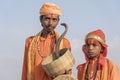Hindu sadhu holy men and snake cobra in Pushkar, India, close up portrait Royalty Free Stock Photo
