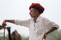 Camel trader hang on and wait for buyers to sell camels in Pushkar Camel Fair.