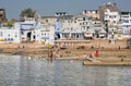 Pushkar lake with hindu people descend to bathe in sacred waters