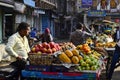 Indian salesman selling fruits on the street market