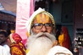 Indian Senior Old Sadhu With Tilak On Forehead and white Beard on streets of India