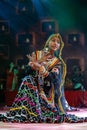 Female artist performing kalbelia dance in pushkar fair