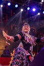 Female artist performing kalbelia dance in pushkar fair