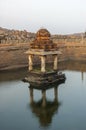 Pushkarni or stepwell adjacent to Krishna Bazaar and partly collapsed temple. Hampi, Karnataka, India