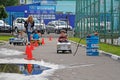 Children driving Soviet pedal cars `Moskvich` at the festival `Retrosummer` in Pushkino