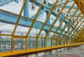 Pushkinskiy or Andreyevsky pedestrian bridge, steel elements of the glass gallery above the pedestrian area