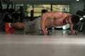 Pushups With Dumbbels Royalty Free Stock Photo