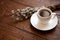 Pussy-willow branch wreath with buds and cup of tea coffee Royalty Free Stock Photo