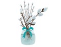 Pussy willow branches in glass vase 