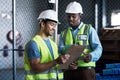 Put safety in the hands of the professionals. two builders inspecting a construction site. Royalty Free Stock Photo