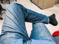 Put on Scottish Jeans, sit on legs in relaxed position Royalty Free Stock Photo