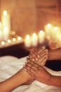 Put your feet up and just relax. a woman enjoying a foot massage at a spa.