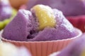 Ube puto with cheese.A Filipino style rice cupcake muffin with ube purple yam flavor.