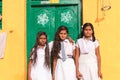 PUTTAPARTHI, ANDHRA PRADESH, INDIA - JULY 9, 2017: Three Indian schoolgirls. Copy space for text.