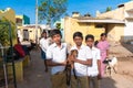 PUTTAPARTHI, ANDHRA PRADESH - INDIA - NOVEMBER 09, 2016: Indian school age boys dressed uniform are posing at the street, outdoor. Royalty Free Stock Photo