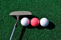 Putter and balls