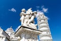 Putti Fountain, Pisa Cathedral Duomo Cattedrale and Leaning Tower Torre on Piazza del Miracoli square Royalty Free Stock Photo