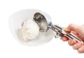 putting ball of ice cream in bowl by disher scoop Royalty Free Stock Photo