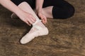 Putting ballet shoes Royalty Free Stock Photo