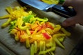 Putting down the knife after slicing bell pepper Royalty Free Stock Photo