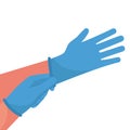 Putting on gloves. Protective latex blue gloves. Symbol of protection against viruses and bacteria.