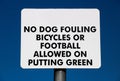 No Dog Fouling or Playing Signpost at a Public Putting Green