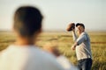 Putting his all into it. father and son playing football on an open field. Royalty Free Stock Photo