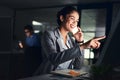 Putting in hours of hard work. a young attractive businesswoman working late at night in a modern office. Royalty Free Stock Photo