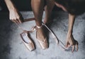 Putting on pink ballet shoes Royalty Free Stock Photo
