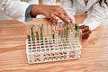 Putting plant life into focus. a child learning about plants with their teacher at school. Royalty Free Stock Photo