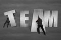 Putting TEAM concrete word together Royalty Free Stock Photo