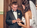 Putting on wedding rings in the church Royalty Free Stock Photo