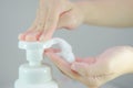 Putting whip foam soap on the hand Royalty Free Stock Photo