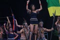 Puyo, Ecuador, 17-8-2019: woman and man of an indigenous tribe called shiwuar performing a dance in traditional cloths