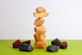 Puzzle as an assembly of wooden blocks in a vertical pyramid, in the form of an Indian totem